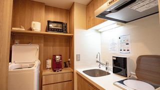 デラックス ダブルルーム クイーンベッド 2 台