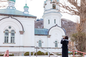 A young woman sightseeing in Hakodate Motomachi