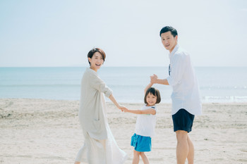 family enjoying sea bathing