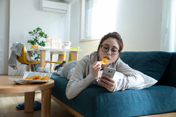 woman lounging in the living room