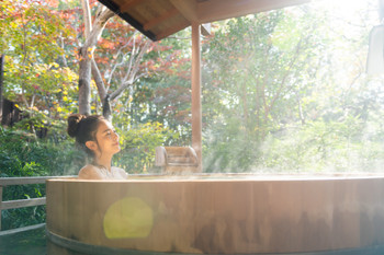 Young woman, onsen, open-air bath, travel