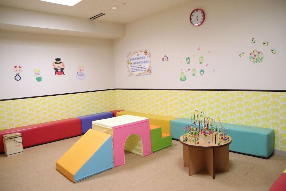 Baby essentials and care on dark wooden table