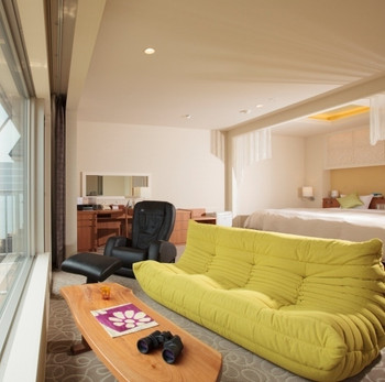 落ち着ける大地をイメージした客室3485549