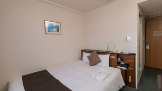 ダブルルーム クイーンベッド 1 台 禁煙