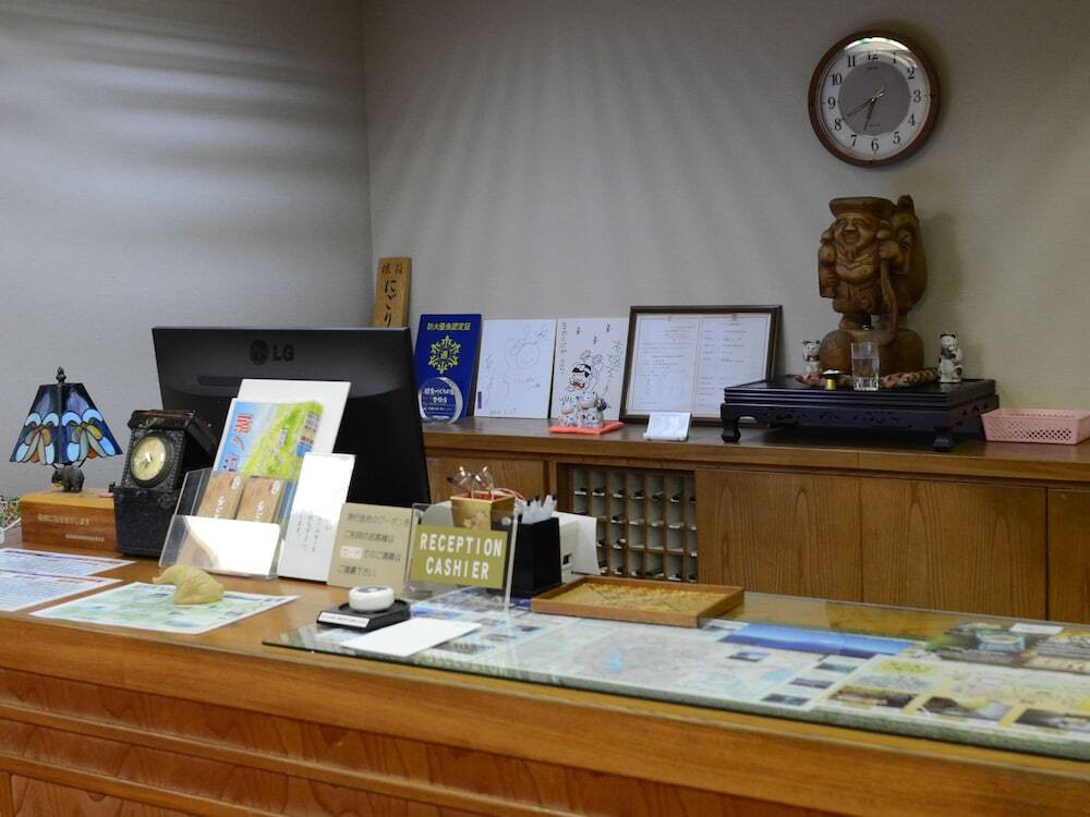 チェックイン / チェックアウト キオスク