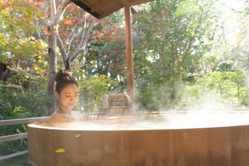 Young woman, onsen, open-air bath, travel