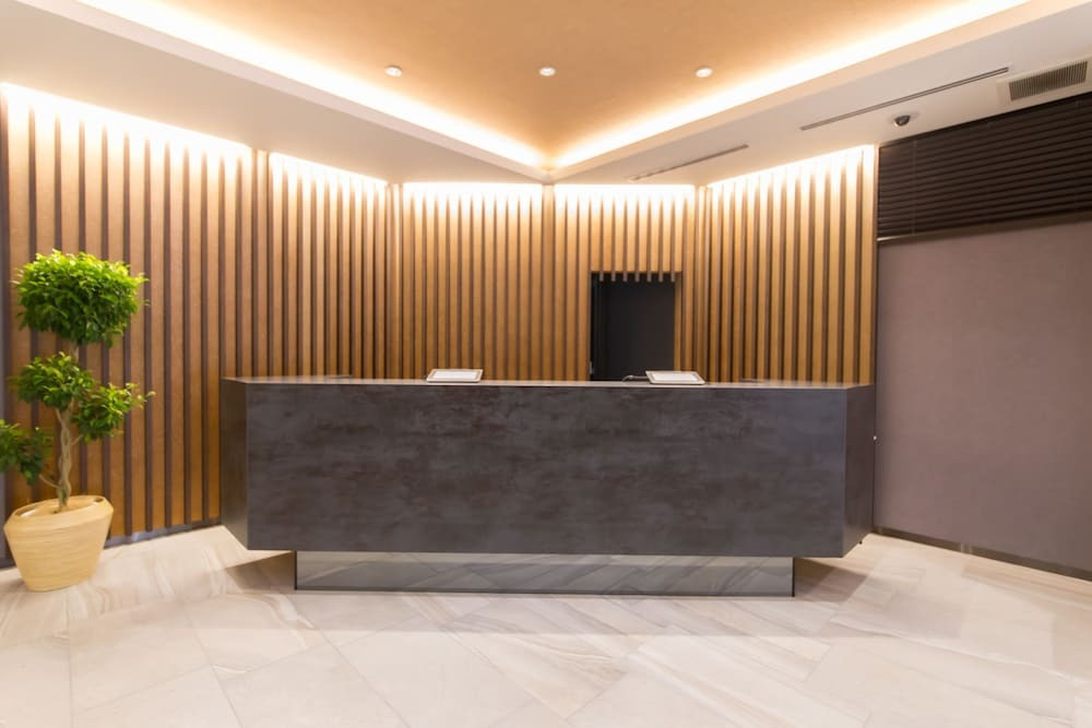 チェックイン / チェックアウト キオスク