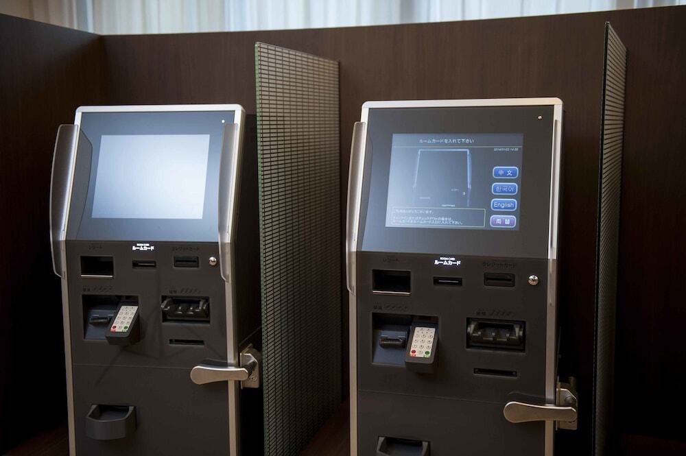 チェックイン / チェックアウト キオスク