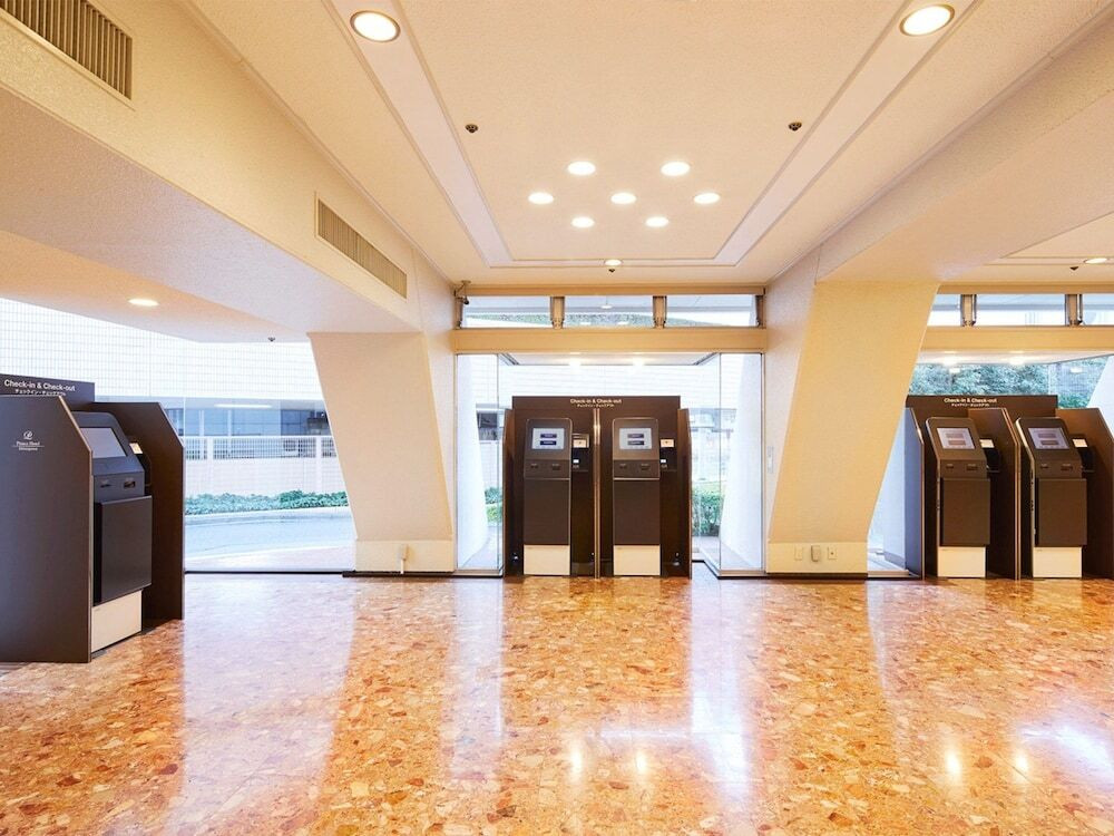 チェックイン / チェックアウト キオスク