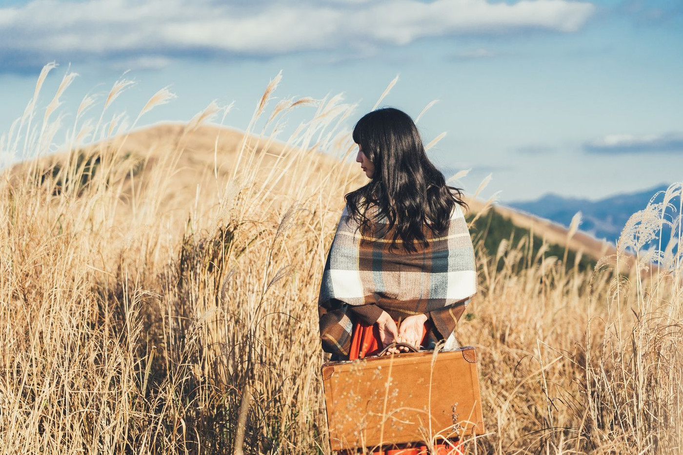 Asian traveller with camera take photo for a fog on a mountain at Japo village
