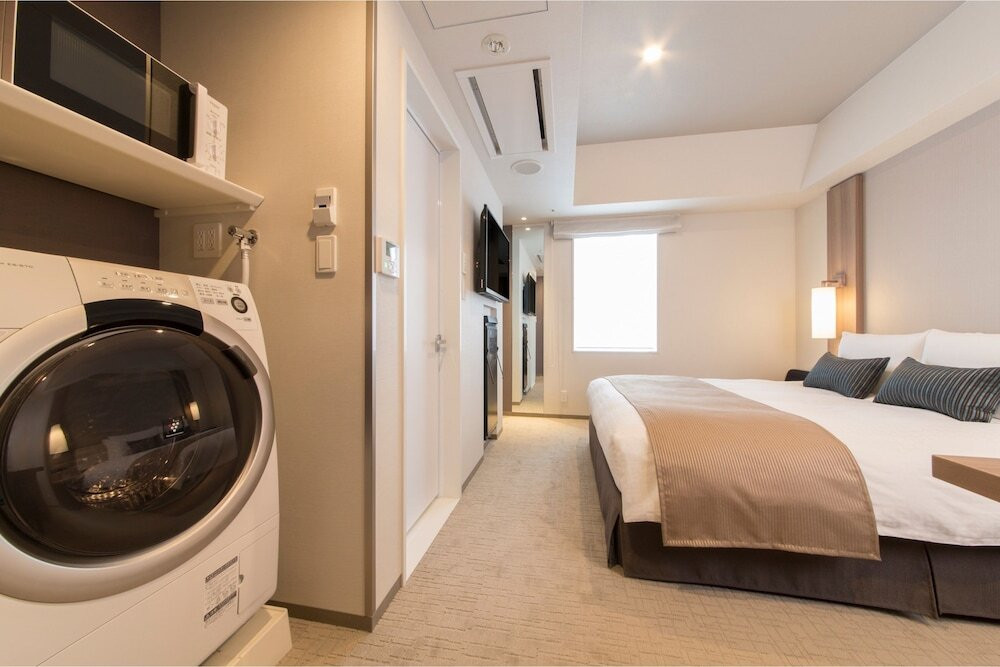 中長期滞在向け!お部屋に洗濯乾燥機と電子レンジ!4243441