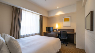 スタンダード ルーム クイーンベッド 1 台 シティビュー