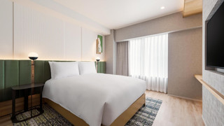 デラックス ルーム クイーンベッド 1 台 (Family Room)