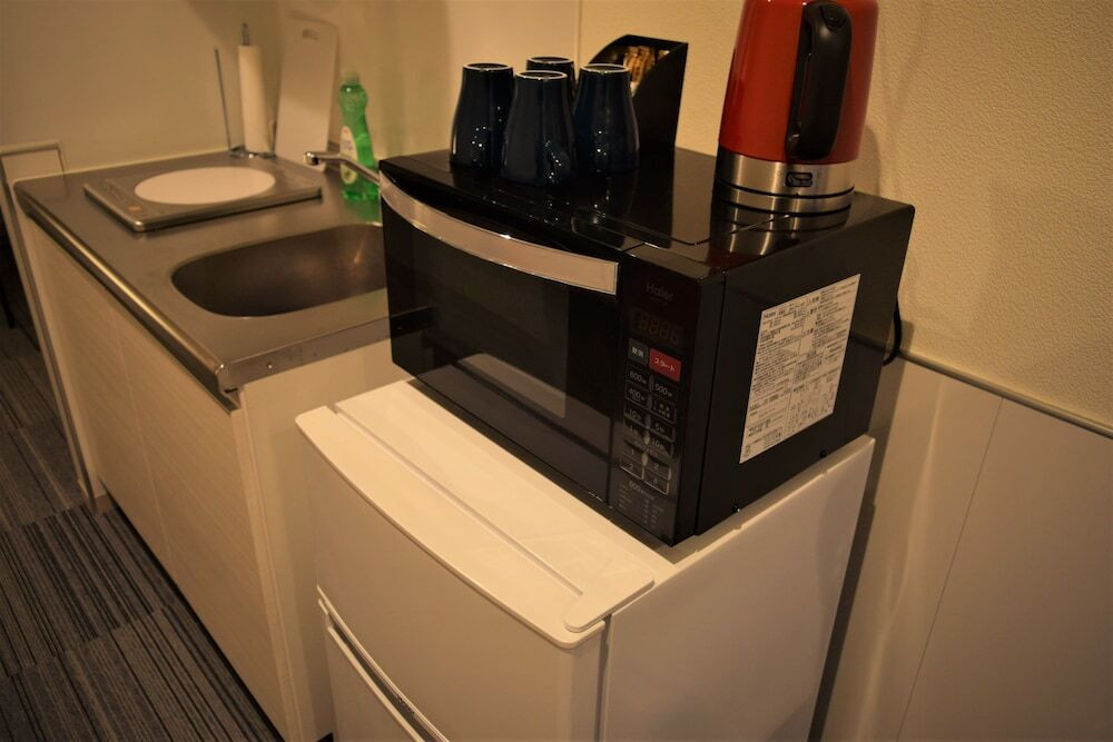 住宅街の中にある、キッチン・洗濯機完備のホテル3448969