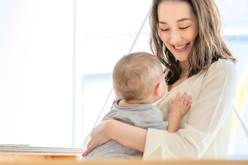 woman holding a child