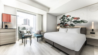 デラックス ルーム キングベッド 1 台 (Yu Standard Floor)