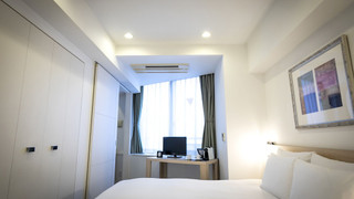 スイートルーム キングベッド 1 台 禁煙(3名利用の場合、エキストラベッド付)