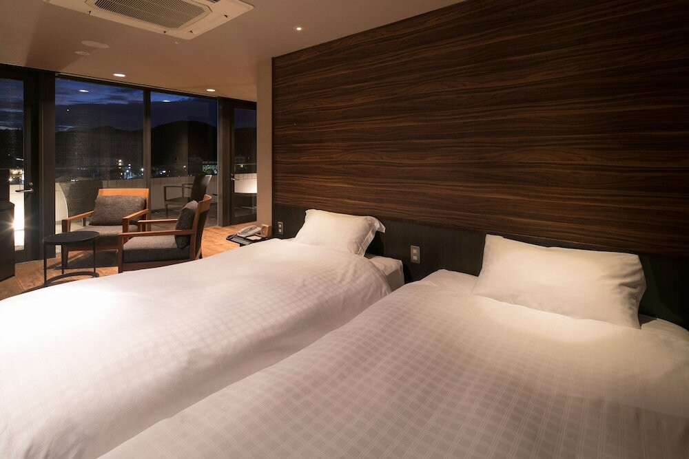 温泉露天風呂付ハーバースパテラスルーム ベッド