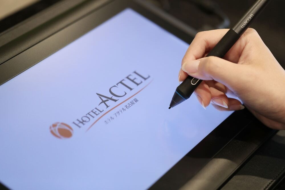 チェックイン / チェックアウト キオスク