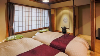 デラックス ダブルまたはツインルーム 専用バスルーム パーシャル オーシャン ビュー