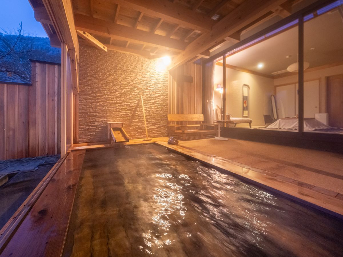 Man and woman swims on kayak in the sea on background of island. Kayaking concept.Kayaking concept