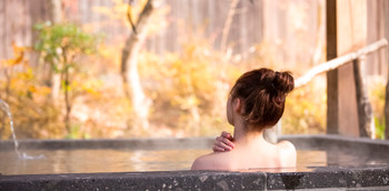 Woman enjoying onsen trip