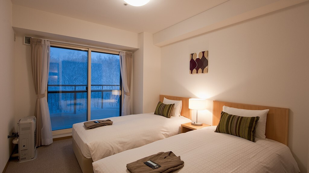 プレミアムグランドスイートのベッドルーム