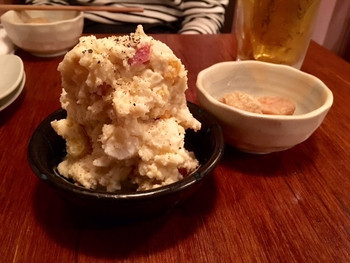 「煮込み屋ぐっつ」 料理 44484719 こんもり盛られたポテサラ！