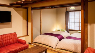 デラックス ダブルまたはツインルーム 専用バスルーム パーシャル オーシャン ビュー