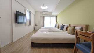 デラックス 4 人部屋 ベッド (複数台) 禁煙 シティビュー