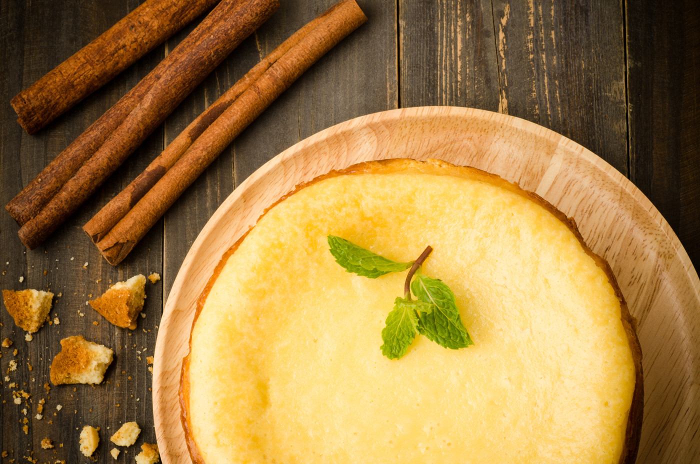 New York cheese cake on wooden background