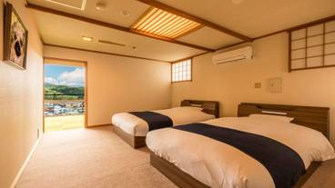 ジュニアスイート和洋室 ベッドルーム / 3