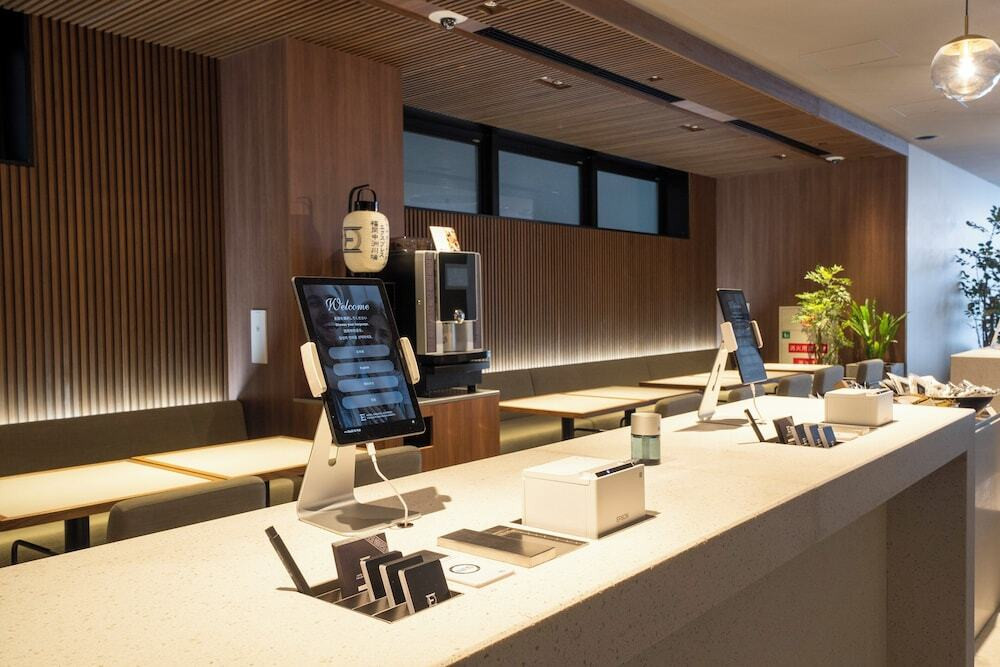 チェックイン / チェックアウト キオスク