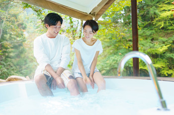 Couple enjoying spa jacuzzi