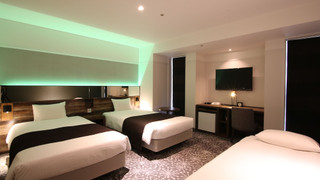 デラックス ツインルーム+ソファーベッド (ユニットタイプバスルーム、トイレ仕切り、シャワーブース)