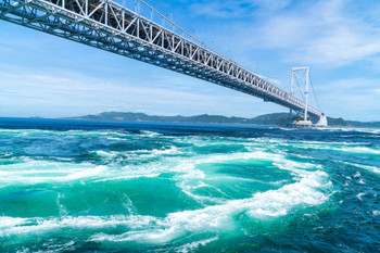 The whirlpools of the Naruto Strait. A tourist image of Awaji Island.