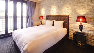 エグゼクティブ ルーム クイーンベッド 1 台 バルコニー