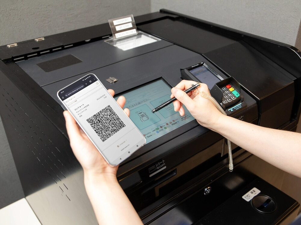 チェックイン / チェックアウト キオスク