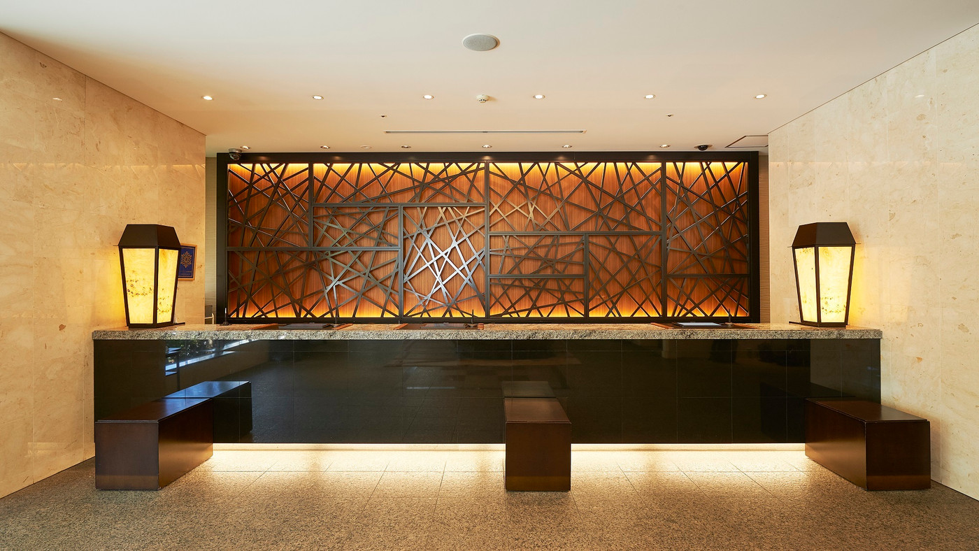 笑顔の接客が「また来たい」と思わせる温かみのあるホテル3848325