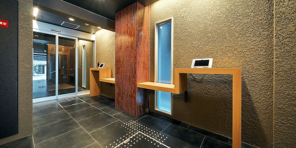 チェックイン / チェックアウト キオスク