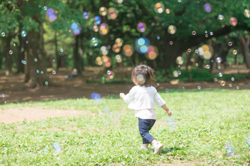 Children and park soap bubbles