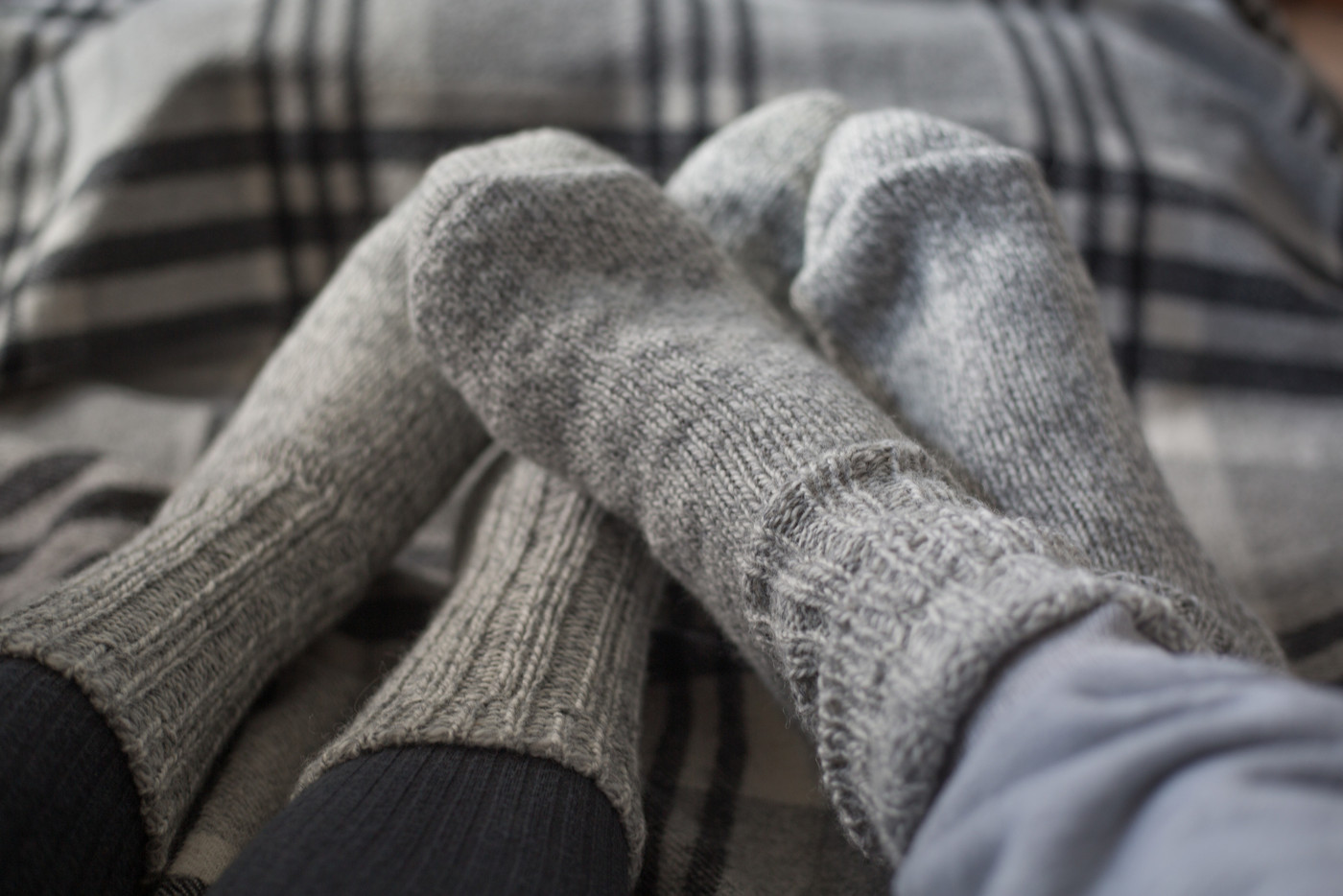 Feet in woollen socks