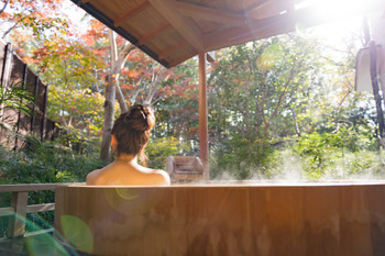 Young woman, onsen, open-air bath, travel, light