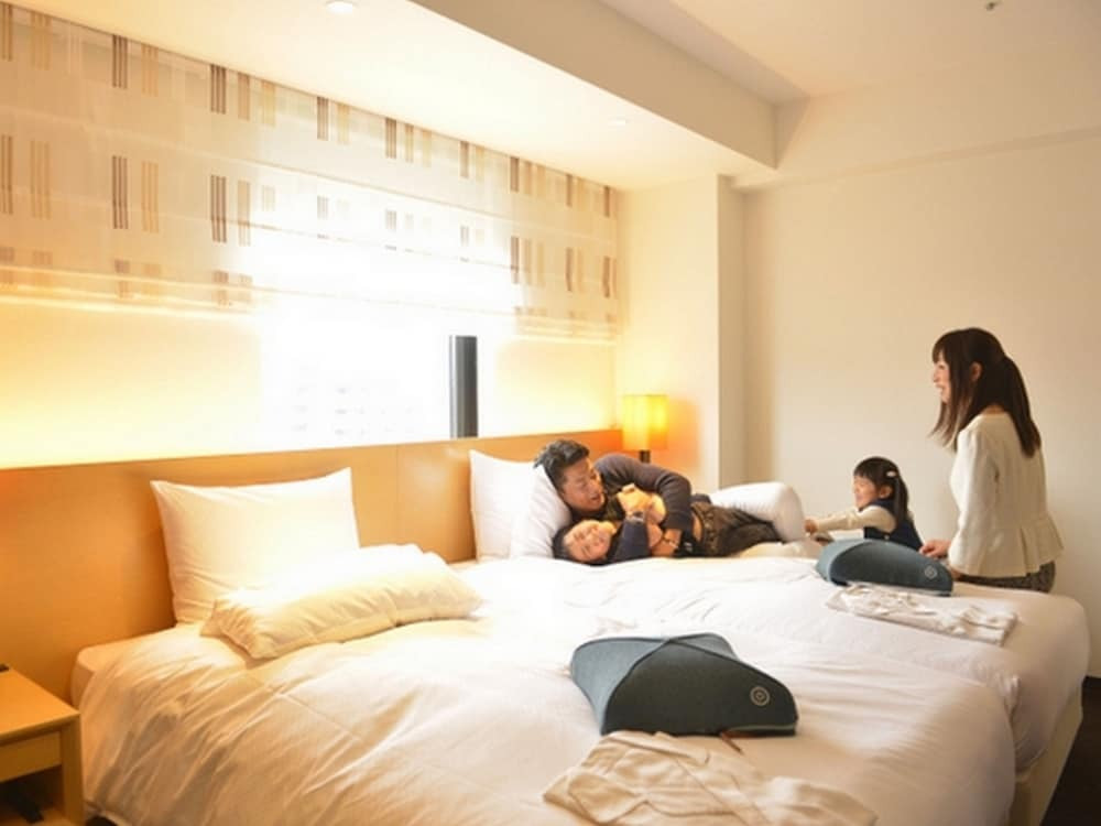 観光や買い物に便利な立地。川の字で眠れるハリウッドツインがおすすめ4069985