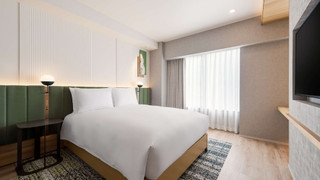 デラックス ルーム クイーンベッド 1 台 (Family Room)