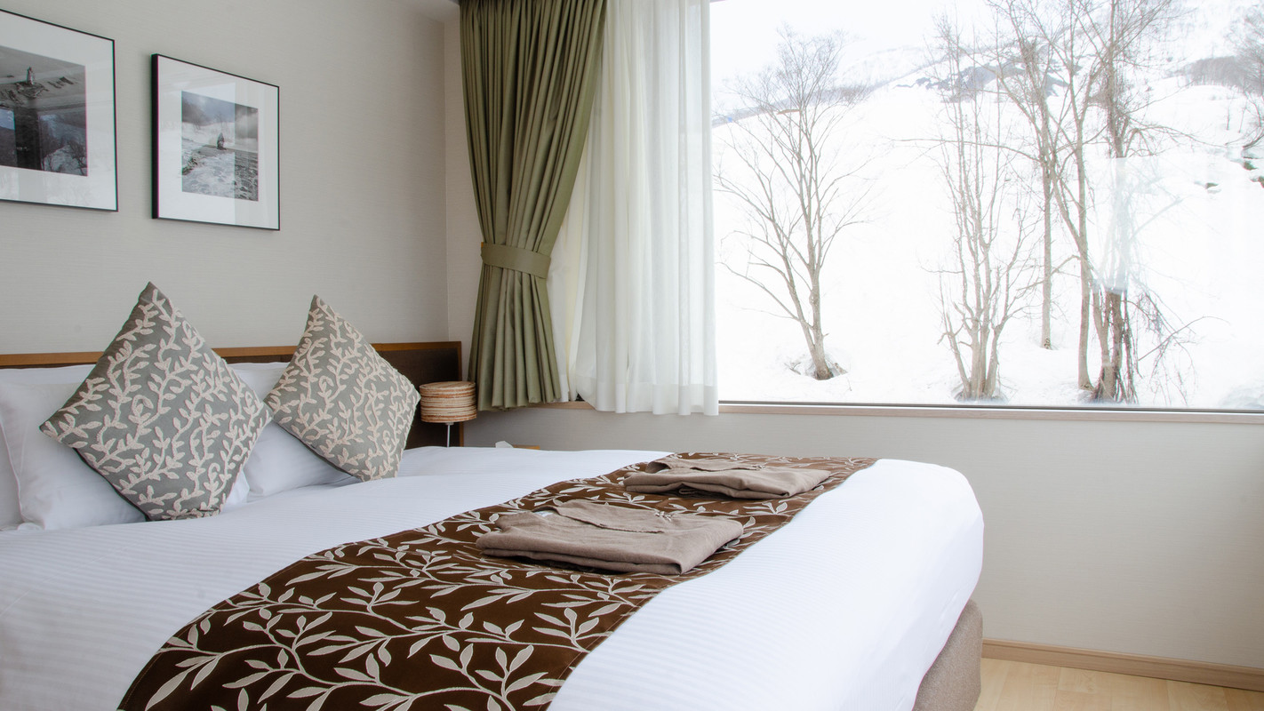 1ベッドルームDX 寝室