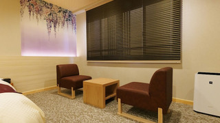 ラグジュアリー ダブルまたはツインルーム 2 ベッドルーム 専用バスルーム パーシャル オーシャン ビュー