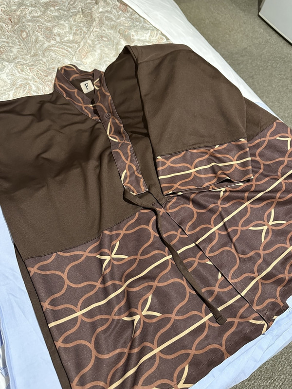 部屋に置いてある寝間着がアイヌ模様。