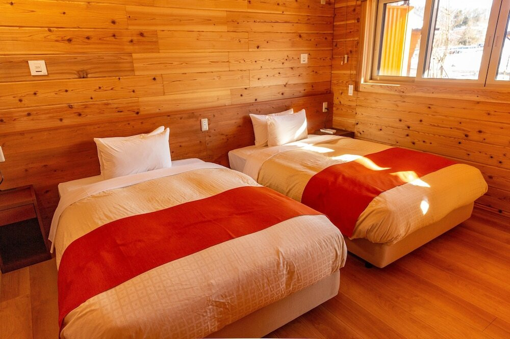 ログハウスの寝室一例