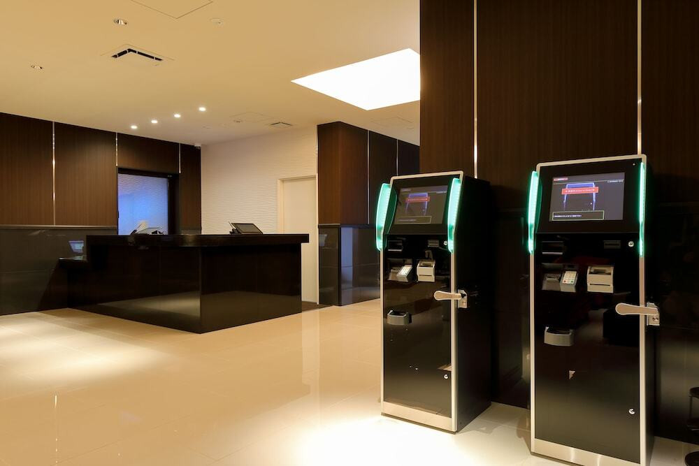 チェックイン / チェックアウト キオスク